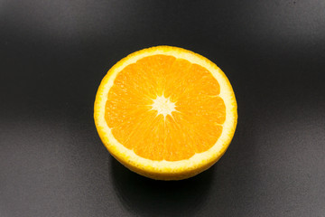  Organic freshness Orange fruit cutting taste sweet and sour on isolate black background