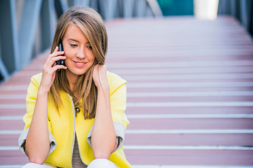 Cheerful businesswoman smiling on the phone