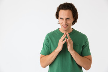 Image of crazy mad man wearing basic t-shirt gesturing as he conspiring plot