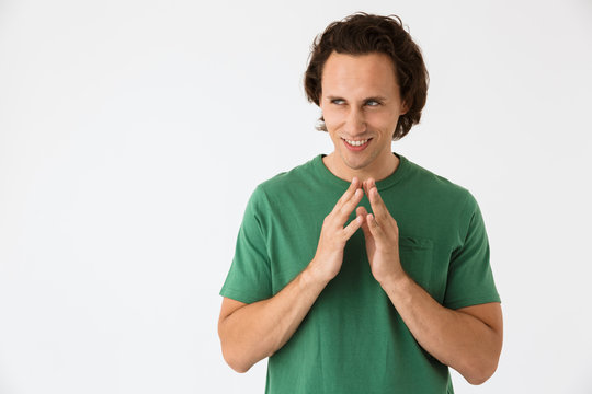 Image of crazy mad man wearing basic t-shirt gesturing as he conspiring plot