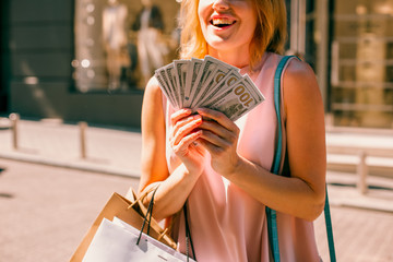 Excited woman with great sum of money stock photo