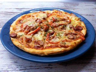 close-up of a big fresh tasty flavorful pizza