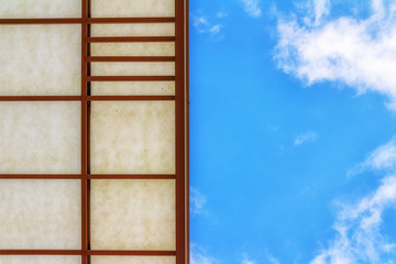 Fototapeta premium window with blue sky and clouds