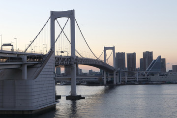 Obraz premium View from Odaiba to Tokyo Bay with Rainbow Bridge at dusk, Tokyo, Japan