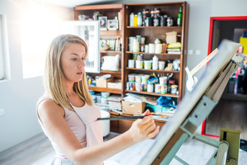 Creative woman working in art studio