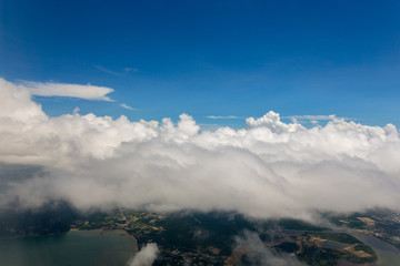 Fototapeta na wymiar View from the airplane clouds over thailand