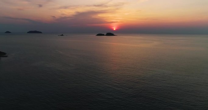 Aerial drone video of tropical sea sunset