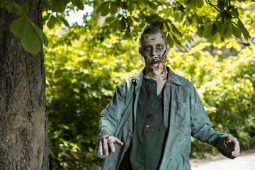 Fototapeta na wymiar Zombies in the forest jaw out