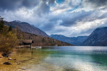 Panoramic spring view of Bohinj lake, located within the Bohinj Valley of the Julian Alps, Slovenia.