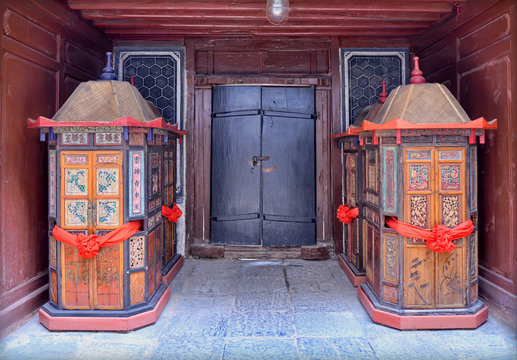 Old palanquins at the door