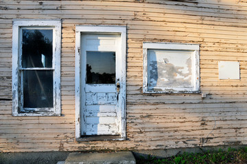 Obraz na płótnie Canvas Old Door and Windows in Abandon Building