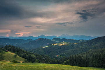 Obraz premium Church on the hill on a beautiful day in Sveti Tomaz, Skofja Loka, Slovenia