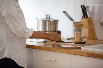 Black skin women prepare cooking dinner in kitchen