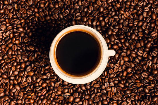 cup of coffee with beans