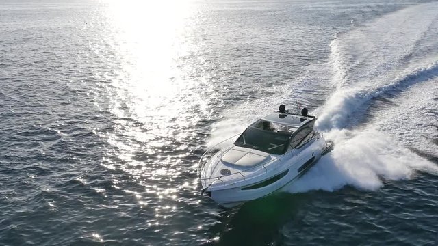 luxury motor boat in navigation aerial view