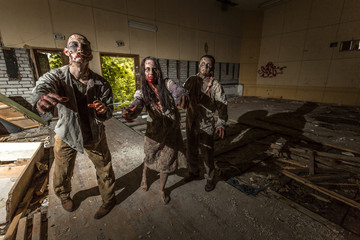 Zombies attack in an abandoned dark building