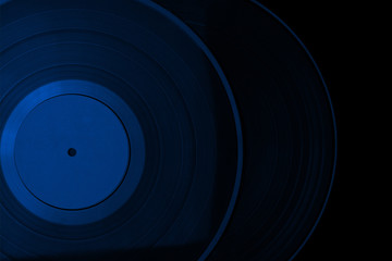 Vinyl record on blue light.