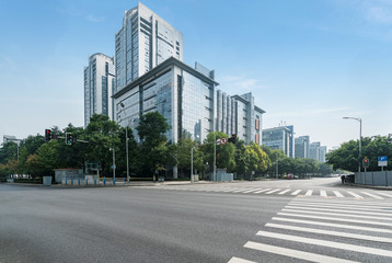 The expressway and the modern city skyline are in Chongqing, China.