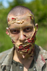 Makeup for zombies, preparing for shooting dead people