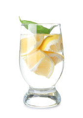 Glass of fresh lemonade on white background