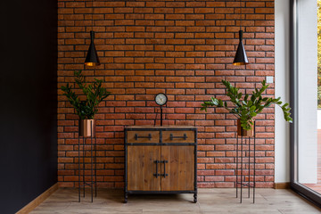 Stylish room with brick wall