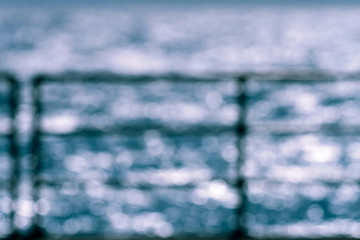 White blurs on aquamarine background