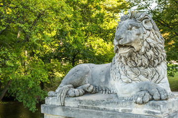 View of lion statute at Laxenburg castles park in the evening, the castles became a Habsburg possession in 1333 and formerly served as a summer retreat, at Laxenburg, Lower Austria, Austria.
