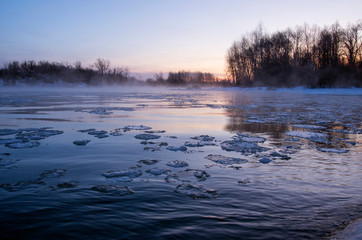 Fototapeta premium Winter dawn on the Belaya river.