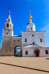 Fototapeta na wymiar Remaining part of the Prince's palace of Andrey Bogolyubsky – the so-called Staircase Tower and Church of the Nativity of the Holy Virgin in Bogolyubovo convent in Vladimir oblast, Russia