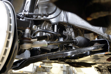 Elements and structure of the front suspension of a modern car. Close-up of the front suspension...