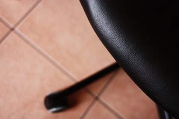Beautiful black leather chair close up view