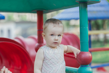 Fototapeta na wymiar close up.portrait of cute little girl on Playground background