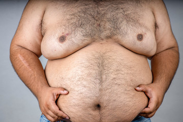 A fat man with a shaggy beard.