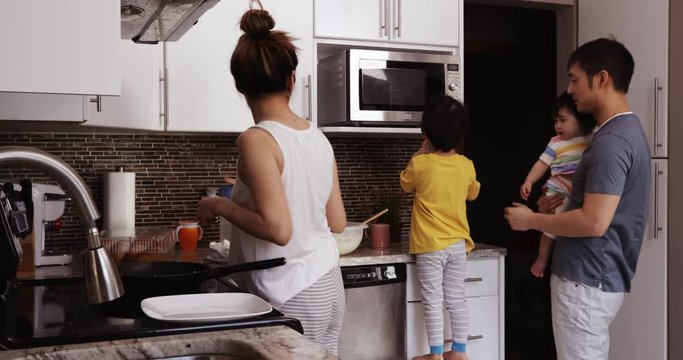 Family enjoying time relaxing together at home