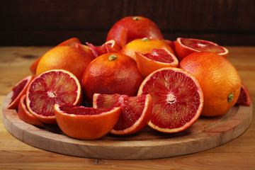 Fototapeta na wymiar Red oranges with copy space background