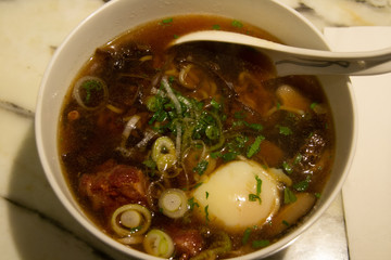 Tokyo ramen noodles with peppery Harissa beef ribs in chicken broth