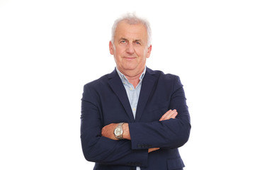Portrait of older man in navy blue suit.