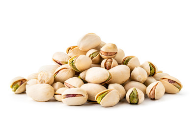 Pile of pistachios in the peel close-up on a white background. Isolated. - Powered by Adobe