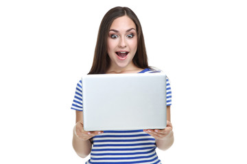 Young girl with laptop computer isolated on white background