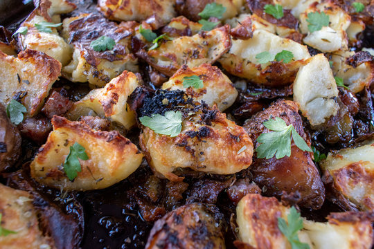 Baked And Roasted Red Potatoes With Herbs And Parsley Flat Lay