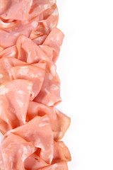 thin slices of mortadella ham isolated on white © Diana Taliun