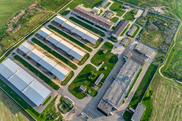 Agricultural plant in the middle of boundless agricultural land. A modern enterprise for the...