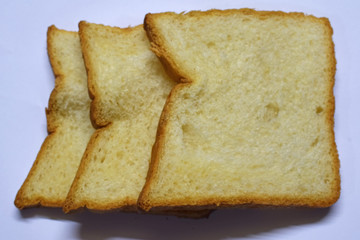 slices of bread on a plate isolated on white