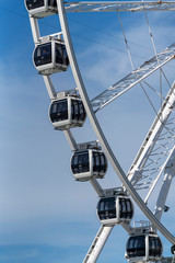 ferris wheel on a sunny day of the hague, netherlands