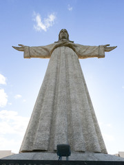 Christ statue on the hill of Lisbon Almada called Cristo Rei - travel photography