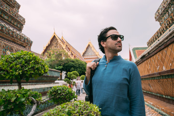 Male tourist in a Buddhist temple.