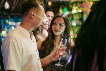 The couple celebrate the New Year at the bar behind the bar.