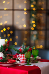Fototapeta na wymiar Christmas table setting. Holiday Decorations
