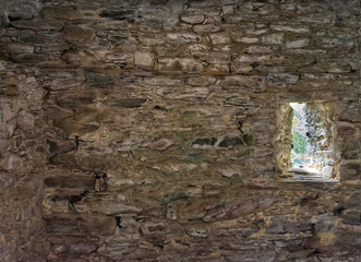 stone wall interior with a side window