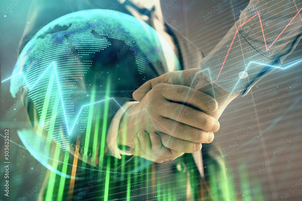 Poster multi exposure of forex graph and world map on abstract background with two businessmen handshake. c